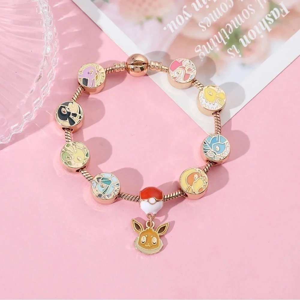 ⭐️NEW⭐️ Gold Plated & Enameled Pokémon Eevee Eeveelution Themed Charm Bracelet - Picture 6 of 8
